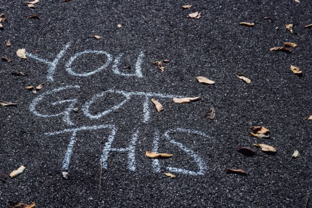 Chalk writing on the ground saying 'you got this'